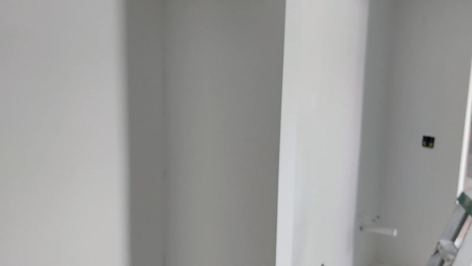 Drywall repair and finishing on interior walls in a Sarasota FL home